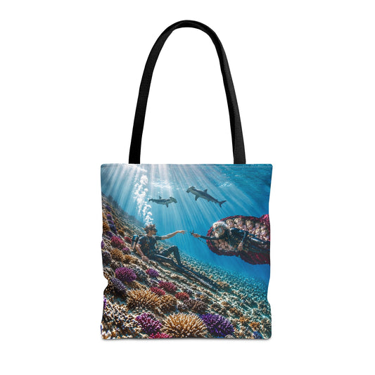 Tote bag with an underwater scene featuring people and sharks on a white background