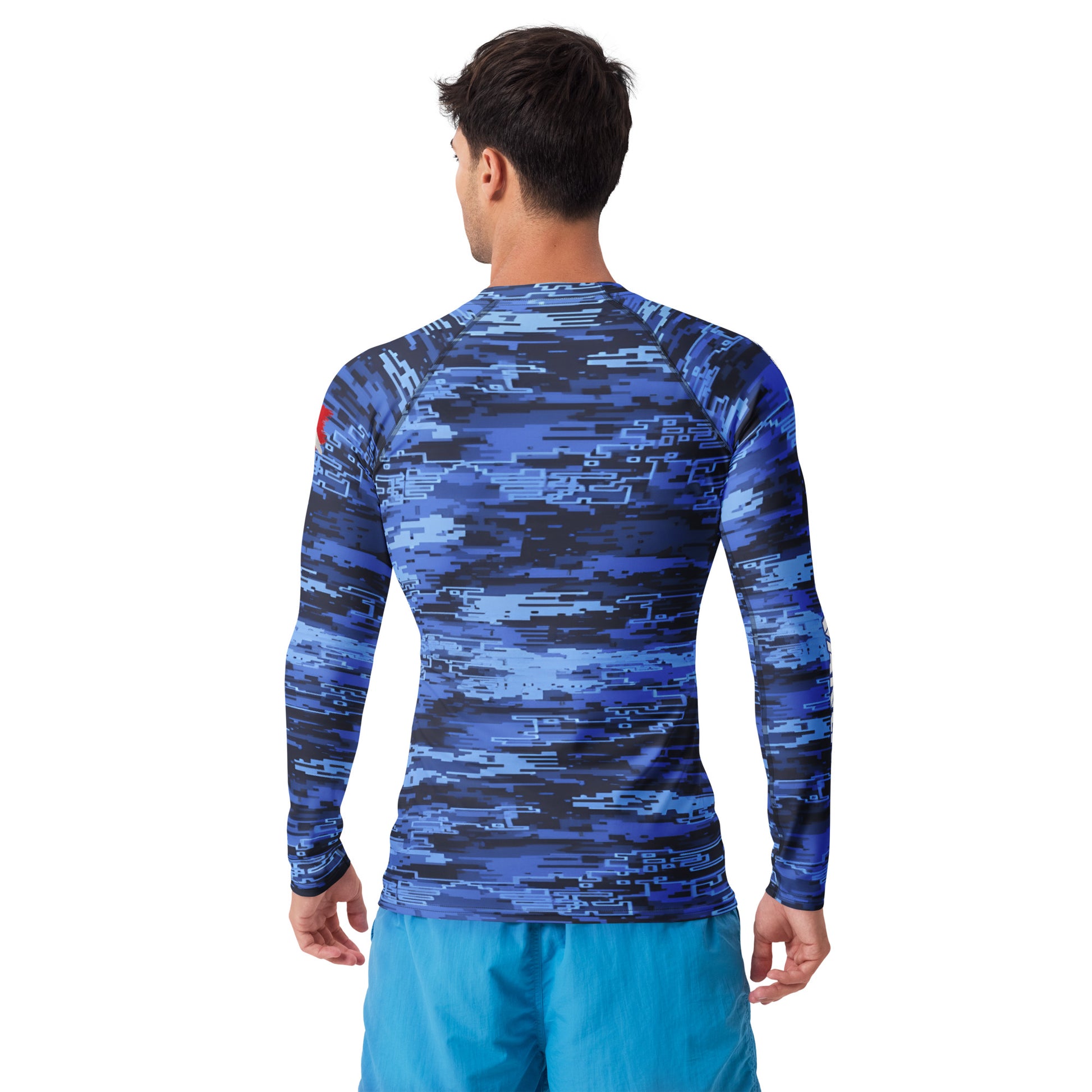 Person wearing a blue camouflage long-sleeve shirt on a white background