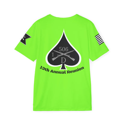 Green t-shirt with black graphic design and text on a white background