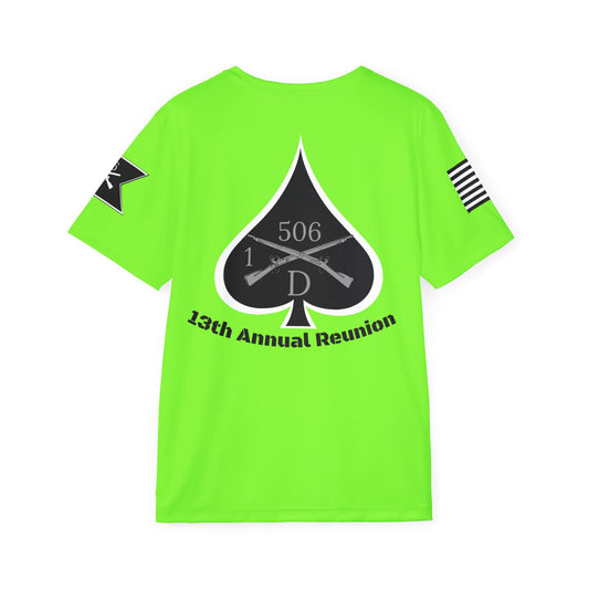 Green t-shirt with black graphic design and text on a white background